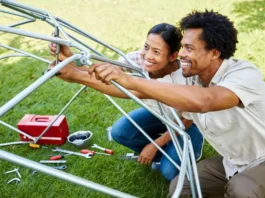 Adults successfully completing easy assembly of a climbing dome, revealing secrets from top reviews.
