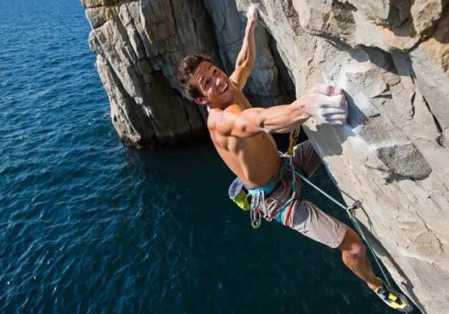 The REAL Damian Cook climber: A pioneer of UK Deep Water Soloing climbing on the Dorset coast.