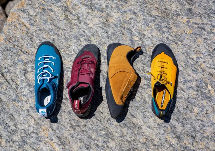 Display of top climbing shoe picks representing beginner, sport, trad, and bouldering categories.