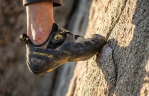 Best Climbing Shoes 2026: Top Picks by Skill & Shape Extreme close-up of a high-performance climbing shoe performing a technical heel hook on granite rock during golden hour.