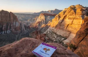 Climbing Red Rocks Nevada: Insider Trip Secrets Panoramic view of Red Rock Canyon, Nevada, showcasing the vibrant sandstone cliffs under golden hour light, symbolizing insider trip secrets for climbing in Red Rocks.