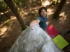 Unlock Boat Rock: SCC, Granite & Bouldering Deep Dive Climber at the summit of a distinctive granite boulder at Boat Rock bouldering area, symbolizing a deep dive into SCC conservation, unique granite features, and bouldering challenges.