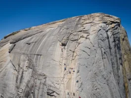 Majestic panoramic view of Half Dome in Yosemite, its detailed granite face symbolizing in-depth beta for yosemite climbing half dome adventures.