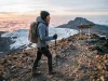 Climbing Kilimanjaro? Days Beat Fitness Every Time Trekker nearing Uhuru Peak at dawn while climbing Kilimanjaro above the clouds
