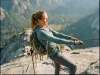Half Dome Has Two Climbs and Most Pick Wrong Hiker on the steep granite cable route climbing Half Dome in Yosemite at golden hour