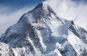 Beyond Everest: Most Difficult Mountain to Climb? Beyond Everest: The imposing, stormy peak of K2, representing the debate over the most difficult mountain to climb.