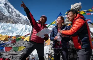 Definitive Best Time to Climb Everest for Planners Expedition planners discussing logistics at Everest Base Camp, illustrating the definitive best time to climb Everest.