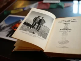 Everest summiteers' iconic stories: an open book showing a historic photo and a symbolic list of people who climbed Mount Everest.