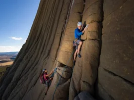 Mastering climbing Devils Tower, Wyoming: diverse climbers on a classic route, showcasing routes, regulations, and respect.