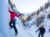 Master Lake City Ice Climbing: Park, Routes & Secrets Mastering Lake City ice climbing: diverse climbers on a tall blue ice formation in the park, showcasing routes and the promise of secrets.