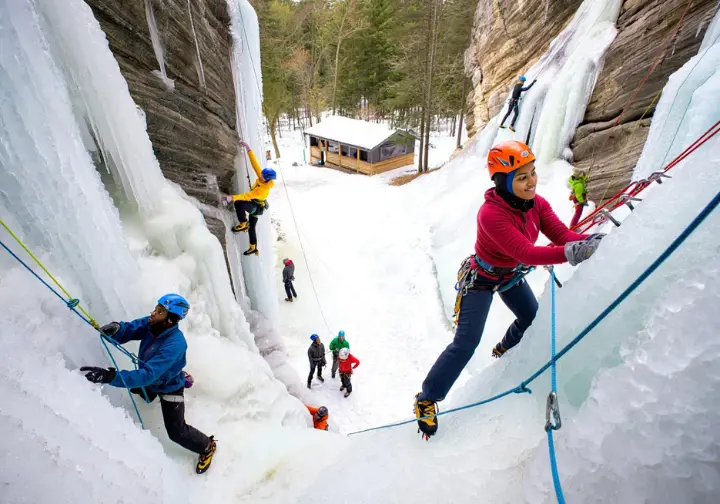 The jewel of Lake City: diverse climbers exploring various routes in the bustling Lake City Ice Park.