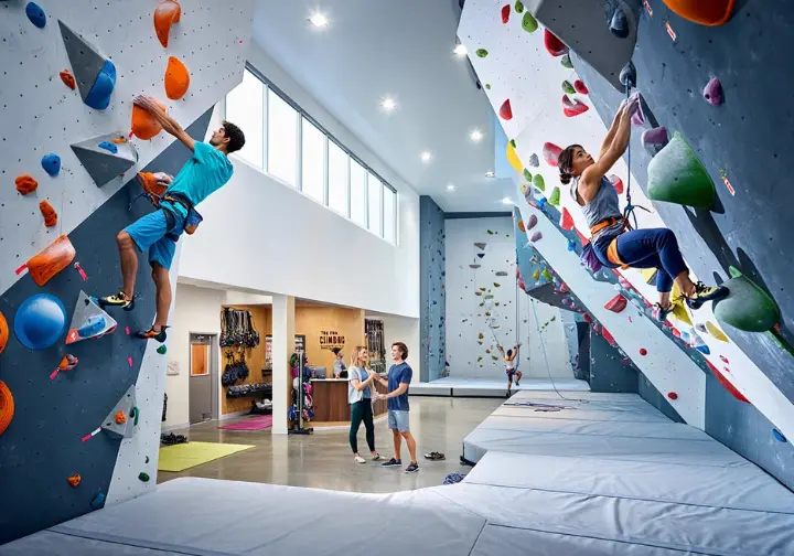 Top indoor rock climbing gyms in San Luis Obispo (SLO): climbers enjoying bouldering and roped climbing at The Pad Climbing.