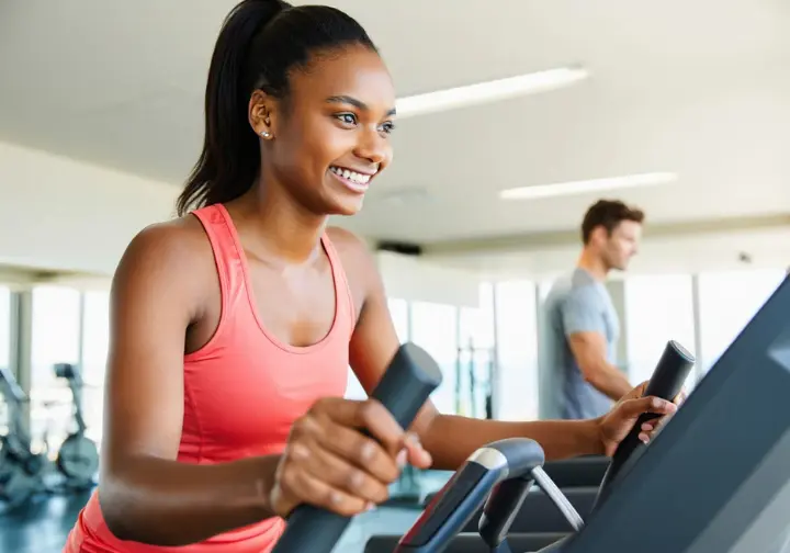 Smart keto workout strategies: Person performing Low-Intensity Steady-State (LISS) cardio like cycling, suitable for keto.