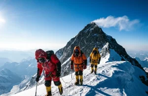 Best Time to Climb Everest Is a 5-Day Window Climbers on the upper ridge of Everest during the May summit window under clear skies