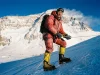 Everest Prerequisites — the Permit Is the Easy Part Climber in La Sportiva double boots on a fixed line high on Everest, the prerequisites for climbing Mount Everest behind