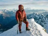 The Most Difficult Mountain to Climb Isn’t Everest Mountaineer on a corniced summit ridge, the most difficult mountain to climb framed at altitude
