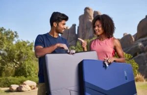 Pick Your Best Bouldering Crash Pad: Full Guide Two diverse climbers outdoors choosing from various bouldering crash pads, illustrating a full guide on how to choose the right crash pad.