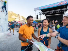 Diverse group of climbers at a vibrant outdoor climbing festival, with scenes of ice climbing, bouldering, and music, representing the 2025 guide to the world's best climbing festivals.
