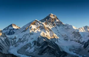 Everest: Beyond the Map | Nepal, Tibet & More A photorealistic image of Mount Everest, the world's highest peak, viewed from a distance, highlighting its location on the border of Nepal and Tibet.