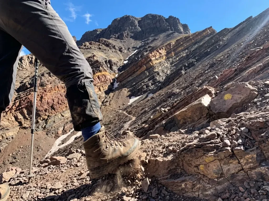 Stratified volcanic rock and scree on Aconcagua's flank showing its extinct stratovolcano geology