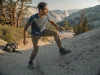 Hiking vs Climbing Shoes Why Boots Skate on Rock Climber in approach shoes standing on granite slab where the hiking trail ends, hiking vs climbing shoes