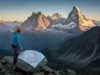 The Climber’s Scorecard: Chamonix vs Zermatt vs Courmayeur A climber studies a map while looking out at a vast alpine panorama representing the choice between Chamonix, Zermatt, and Courmayeur.
