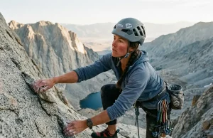 Why the East Face of Mt Whitney Isn’t Really 5.7 Climber on the exposed granite of the East Face of Mt Whitney at first light