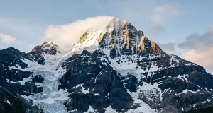 Robson’s Emperor Face Humbles Alpine Masters The Mount Robson Emperor Face at dawn, its 1,500-meter northwest wall of ice and choss above Berg Lake