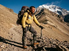Aconcagua Isn’t Technical—So Why Do Most Turn Back Climber on Aconcagua's upper slopes in double mountaineering boots, summit ridge behind