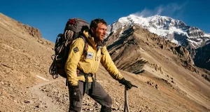Aconcagua Isn’t Technical—So Why Do Most Turn Back Climber on Aconcagua's upper slopes in double mountaineering boots, summit ridge behind