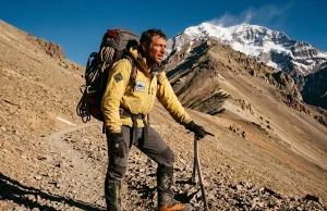 Aconcagua Isn’t Technical—So Why Do Most Turn Back Climber on Aconcagua's upper slopes in double mountaineering boots, summit ridge behind