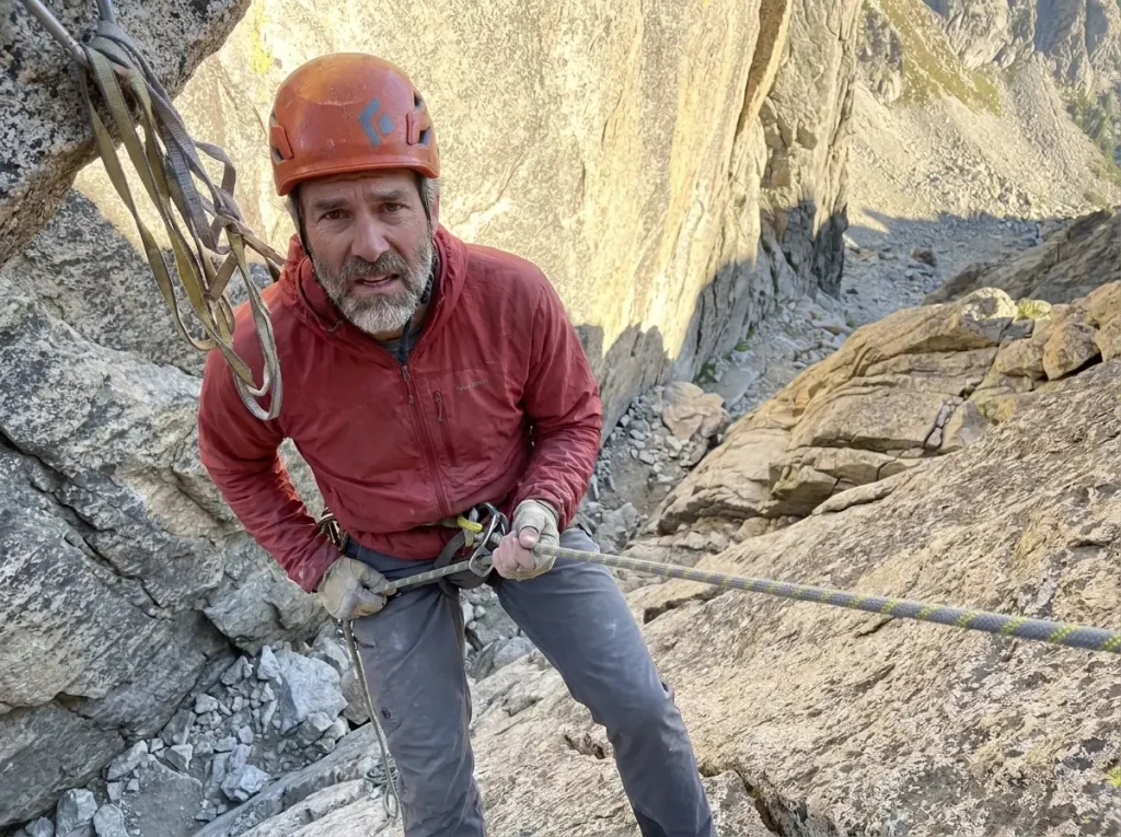 Climber rappelling the Owen-Spalding on the Grand Teton, the descent crux and route-finding