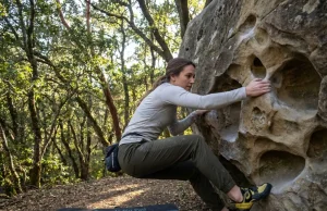Castle Rock Bouldering California Before You Drive Out Climber pulling on tafoni sandstone pocket at Castle Rock bouldering California