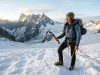 North Cascades Climbing the Guidebooks Get Wrong Climber on a North Cascades glacier at dawn, the range's peaks behind — North Cascades climbing guide