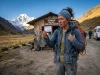 Do You Need a Peru Climbing Permit? Not Really Climber holding a Huascaran park ticket at a Cordillera Blanca checkpoint, the real Peru climbing permit