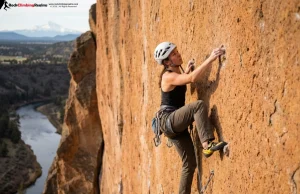 I Climbed 200+ Smith Rock Routes. Start Here Climber ascending orange volcanic tuff wall at Smith Rock State Park Oregon