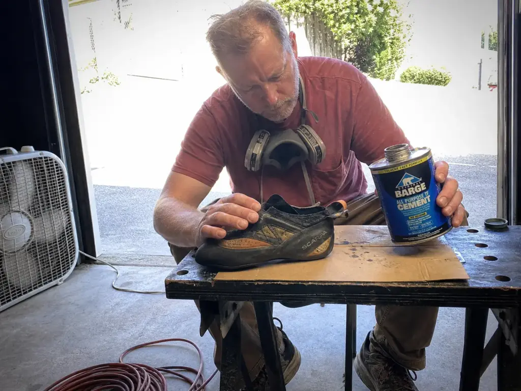 Working with toluene-free contact cement in a ventilated garage with the door open for airflow