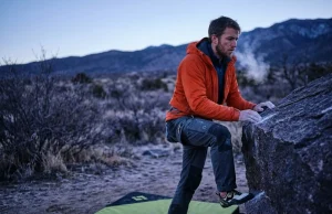 Hueco Tanks Bouldering Winter Conditions? The Real Beta Climber with Patagonia jacket and Black Diamond pad at Hueco Tanks freezing dawn