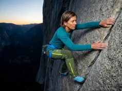 Lynn Hill Said “It Goes Boys” Then Proved It on The Nose Lynn Hill-style female climber on Yosemite granite big wall at dawn