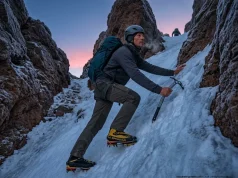 Can You Climb Mount Shasta Right Now? Read This First Mountaineer front-pointing up the Red Banks chimney on Mount Shasta in early morning frozen conditions