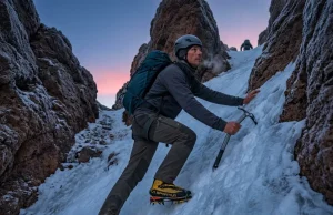 Can You Climb Mount Shasta Right Now? Read This First Mountaineer front-pointing up the Red Banks chimney on Mount Shasta in early morning frozen conditions