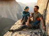 Shoulder Dislocated on a Climb? Here’s What to Do Climber with dislocated shoulder sitting on granite ledge while partner assesses injury in the high Sierra