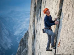 I Froze 40 Feet Above My Last Cam. Here’s What Fixed It Trad climber frozen above last cam on exposed granite face, fear visible in body language