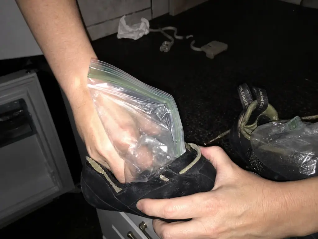 Water filled freezer bags stuffed into climbing shoes before going in the freezer to stretch them