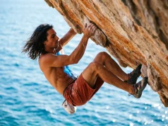 Chris Sharma Deep Water Soloing Legacy As I Remember It Chris Sharma deep water soloing legacy hanging over the ocean.