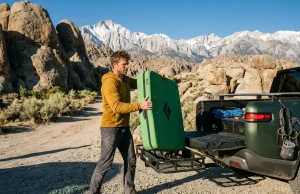 EV Charging at Remote Crags What Most Guides Miss Climber packing gear into a Rivian electric vehicle charging for climbing road trips.