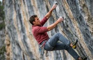Why You’re Pumping Out — And How to Fix It Male rock climber with pumped forearms gripped on a steep limestone route to show how to build sport climbing endurance