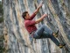 Why You’re Pumping Out — And How to Fix It Male rock climber with pumped forearms gripped on a steep limestone route to show how to build sport climbing endurance