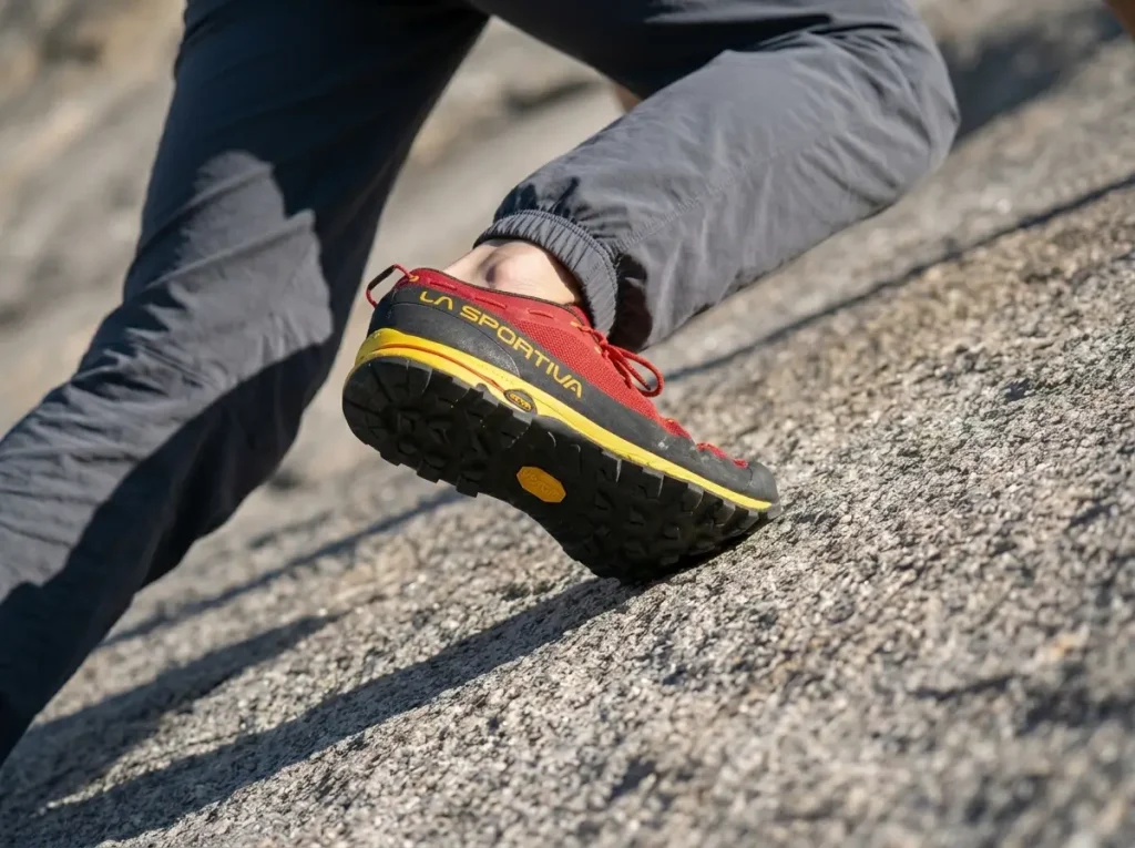 Close up of La Sportiva approach shoe smearing on granite for Longs peak keyhole route guide colorado.