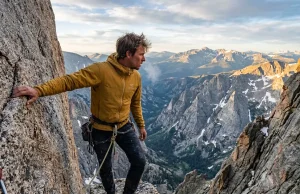 Longs Peak Keyhole Route: What Goes Wrong and Why It Matters Climber looking through the Keyhole on Longs peak keyhole route guide colorado at sunrise.